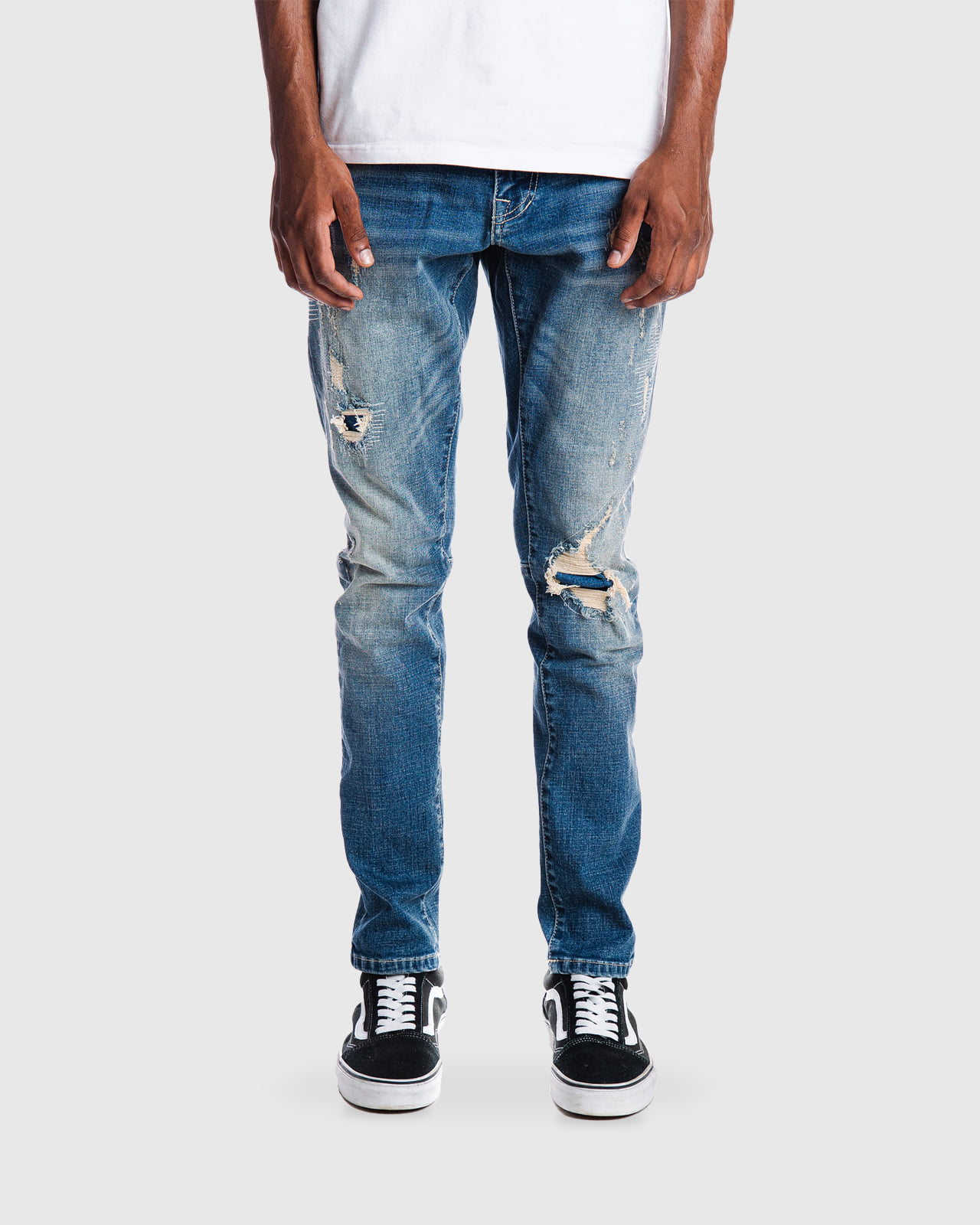 Rip and repair semi-basic jeans