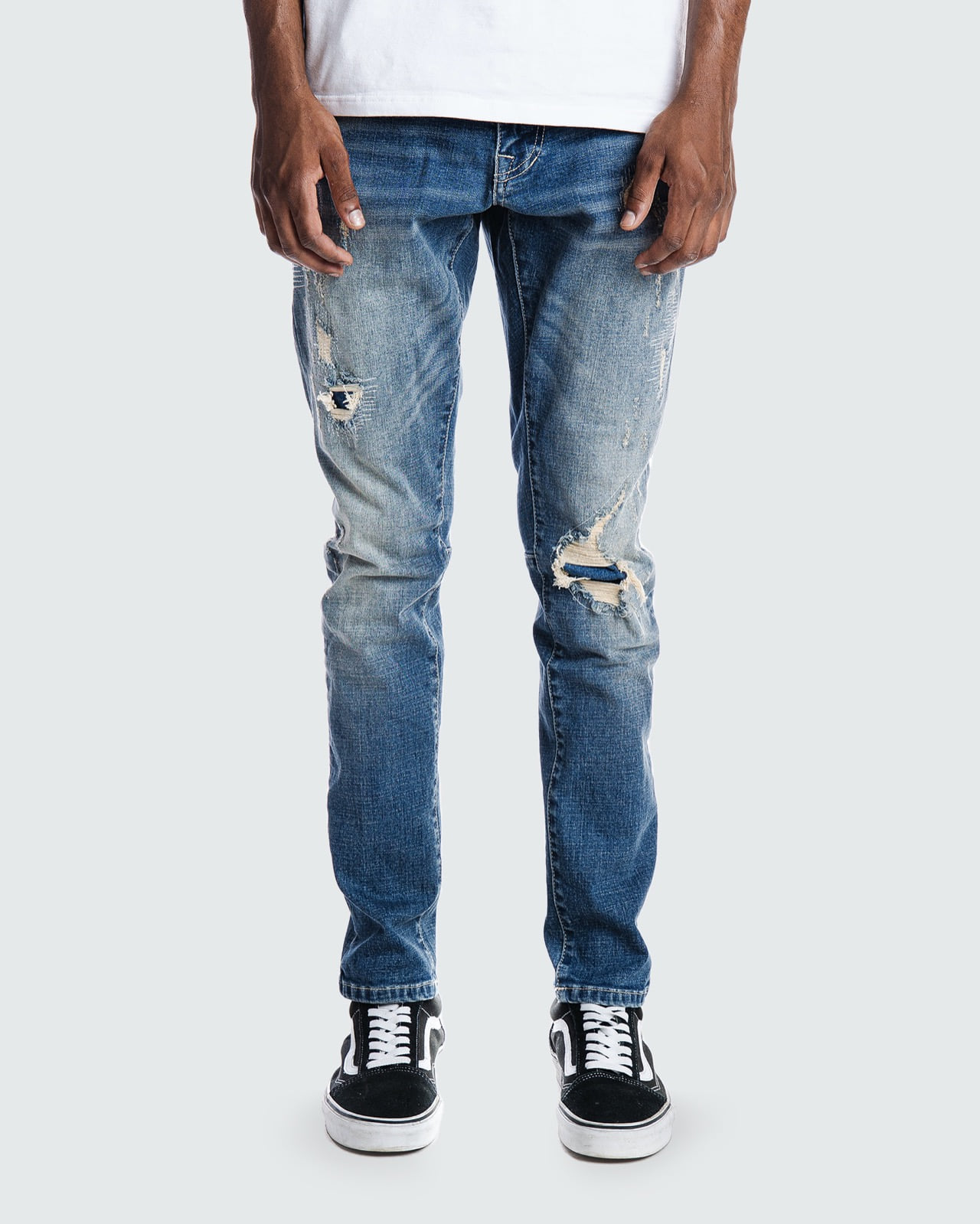 Rip and repair semi-basic jeans